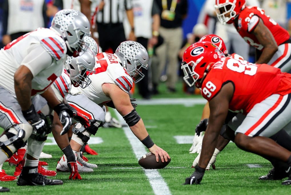 The Ohio State Buckeyes offense lines up against the Georgia Bulldogs defense during the third quarter in the Chick-fil-A Peach Bowl at Mercedes-Benz Stadium on December 31, 2022 in Atlanta, Georgia.