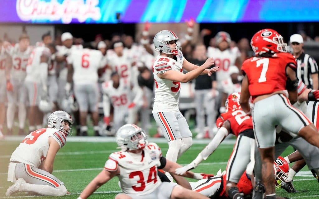 Atlanta, Georgia, USA; Ohio State Buckeyes place kicker Noah Ruggles (95) misses the game winning field goal against Georgia Bulldogs during the fourth quarter of the Peach Bowl in the College Football Playoff semifinal at Mercedes-Benz Stadium.