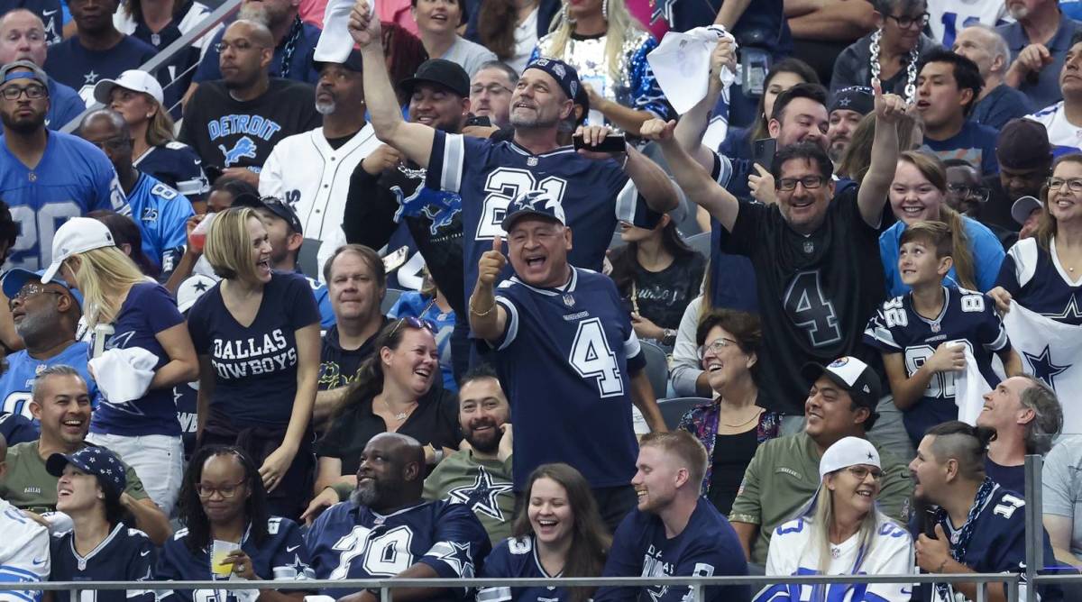 Dallas Cowboys fans in the stands.